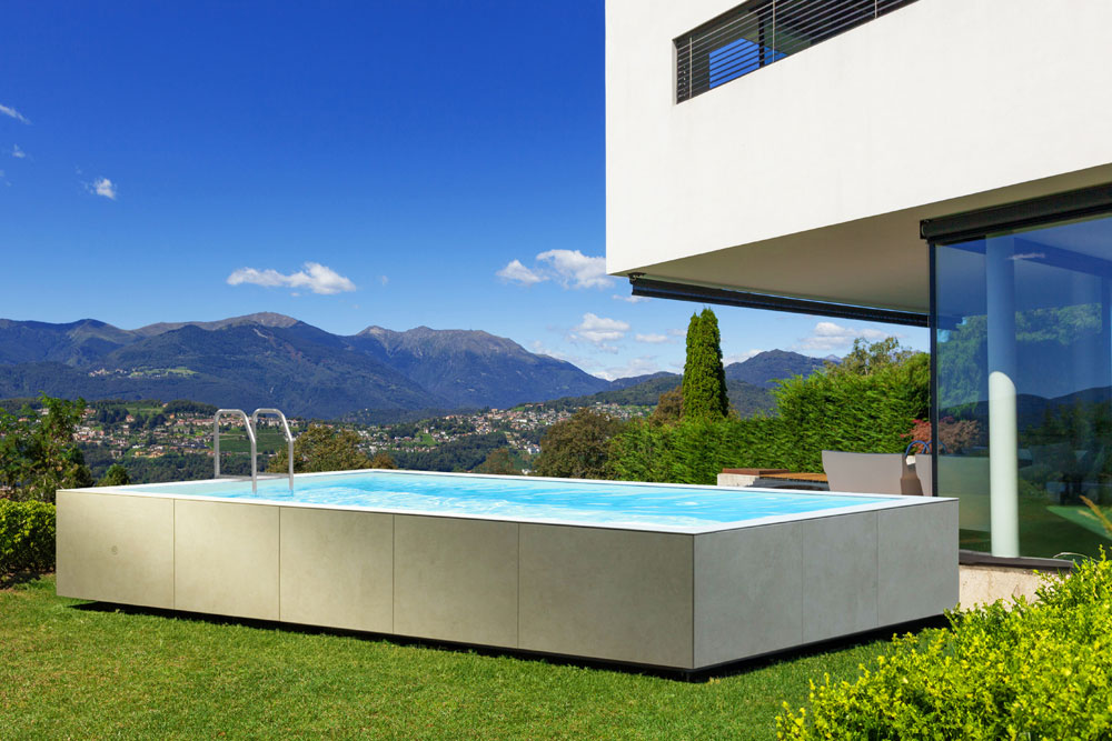 Piscina fuori terra / seminterrata rigida - rivestimento in lastre ceramiche
